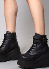 Demonia Shaker Platform Boots in Black