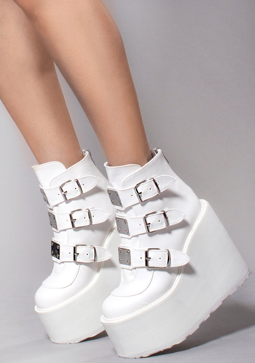 Demonia Swing Strapped Platform Boots in White